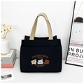 Detail of black canvas tote bag featuring cute teddy bear embroidery and webbed handles - Embroidery Style - Black