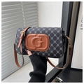 Detail of grey floral pattern handbag with brown leather G logo and gold hardware - Black