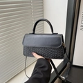Minimalist black crossbody bag featuring woven texture and smooth PU leather finish - Black