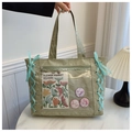 Bolso ita verde claro con ventana transparente, cintas azules y textura fruncida - Verde