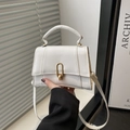 Minimalist white faux leather handbag with golden U-shaped clasp and round top handle - White