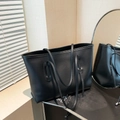 Minimalist black large capacity tote bag in textured matte leather with long shoulder straps - Black