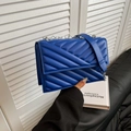 Blue crossbody bag with V-shaped quilting and silver chain strap for women - Blue