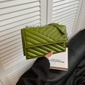 Grass green quilted faux leather crossbody bag with silver chain strap and V-shaped stitching - Green