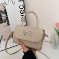 Mini champagne gold sequin handbag with silver metal bow and detachable shoulder strap - Gold