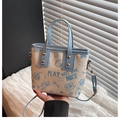 Contrast color tote bag in off-white leather with blue cartoon graffiti and charms - Blue