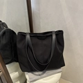 Minimalist black large capacity nylon tote bag with leather straps for daily commute - Black