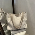 Large cream nylon tote bag with brown leather handles for women's daily commuting - Off White