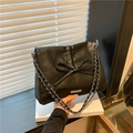 Chic black tote bag with bow detail and silver chain strap for women's fashion - Black