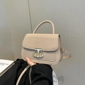 Borsa a tracolla bicolore in tessuto beige e kaki con chiusura a T dorata elegante - Kaki