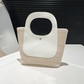 Large beige woven straw tote with white leather top handle and vintage contrast stitching - White