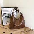 Retro braune Leder-Einkaufstasche mit Quasten und Vintage Hobo-Stil für moderne Damen - Braun