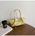 Chic pale yellow woven handbag with bow tie decoration and soft pleated styling - Yellow