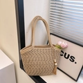 Large beige woven straw tote bag with black dots, thin handles, and stylish tassel pendant - With Pendant / Khaki