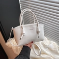 White vintage square handbag with round handles and decorative fashion knots - White