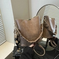Vintage brown leather bucket bag with woven handle and cute rabbit pendant detail - With Pendant / Tan