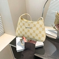Chic cream vintage baguette bag with retro monogram pattern and twisted leather handle - Yellow