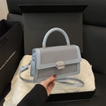 Light blue contrast-colored square handbag with woven texture and silver buckle - Blue