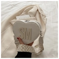 Chic cream heart-shaped crossbody bag with SM logo and woven guitar strap - White