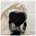 Fashion heart-shaped crossbody bag in matte black with wide geometric woven strap - Black