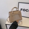 Chic beige crossbody bag with a transparent front pocket and minimalist PU leather finish - Khaki