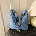 Borsa tote in denim azzurro con design multi-tasche e tracolla regolabile - Azzurro