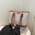 Bolso tote vintage beige con patrón geométrico oscuro y ribete de cuero marrón - Caqui