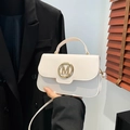 Creamy white leather crossbody bag with golden M metal logo and top handle detail - Off White