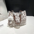 Graffiti canvas tote bag with brown leather chain handles and plush cloud charm - With Pendant / Brown