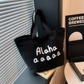 Minimalist black canvas tote bag with Alaha letter print for daily casual commute - Black