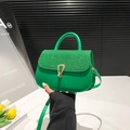 Bright green crossbody bag with sparkling sequin flap and golden horseshoe lock - Green
