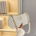 White crescent underarm bag with repeating M-pattern and elegant gold chain strap - Off White