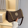 Brown crescent shoulder bag with letter M monogram pattern and golden chain strap - Brown