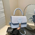 Minimalist light blue square shoulder bag with woven flap and gold metal buckle - Blue