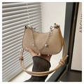 Close-up detail of stylish glitter shoulder bag with metallic chain and pearl pendant. - Khaki