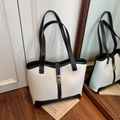 Chic black and white contrast tote bag with golden twist lock and long shoulder straps - Black