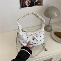 Bolso de moda blanco crema con estampado de lazos y colgante de corazón de plata elegante - Blanco