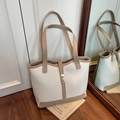Chic white tote bag with khaki trim and golden lock detail for elegant daily use - Khaki