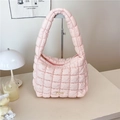 Minimalist light pink quilted cloud shoulder bag with sleek metallic striped logo detail - Pink