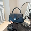 Elegante schwarze Handtasche aus Kunstleder mit Glitzer-Akzenten und Silberverschluss - Schwarz