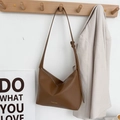Brown minimalist hobo shoulder bag in soft synthetic leather with adjustable strap - Brown
