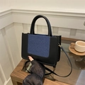 Women's small square crossbody bag in black leather and blue denim patchwork style - Black