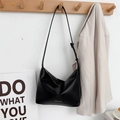 Minimalist black matte leather tote bag with adjustable shoulder strap for daily use - Black