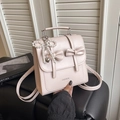Zaino rosa da donna con fiocchi decorativi e ciondolo di perle eleganti - Con Ciondolo / Rosa