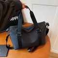 Grande borsa da viaggio nera in tessuto Oxford con tracolla regolabile e fibbie in metallo - Nero