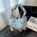 Sac bandoulière en denim bleu clair avec breloques papillon et strass scintillants - Bleu clair