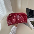 Chic burgundy pleated clutch bag with gold mushroom rivets and glossy finish - Red