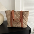 Quilted tote bag in khaki finish with brown handles and front pocket for women - Khaki