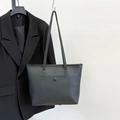 Large black leather tote bag with lychee texture and front pocket for daily commute - Black