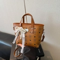 Brown faux leather bucket bag with bear print, lace bow, and pearl heart charms - With Pendant / Brown